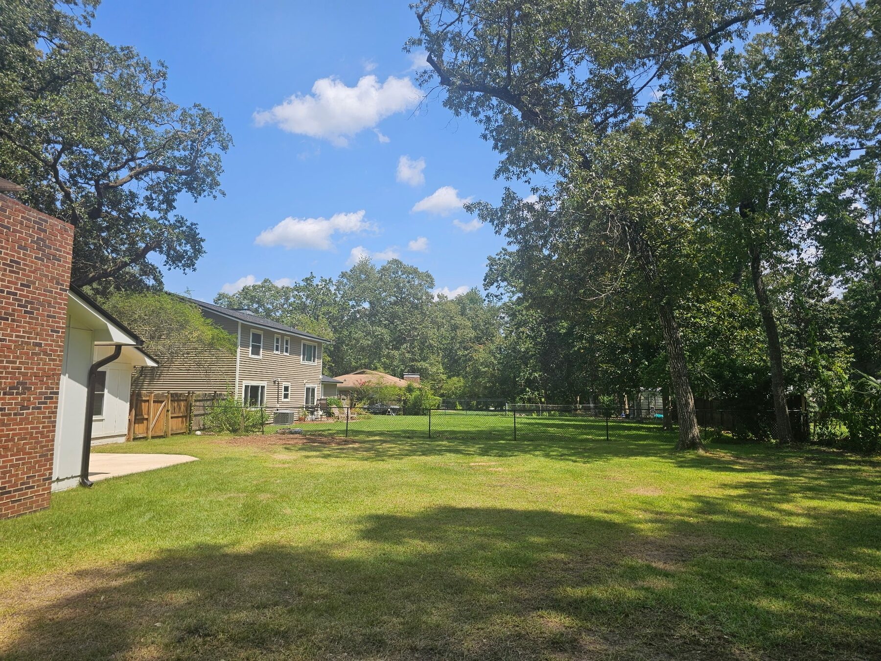 Wide view of a cleared residential yard